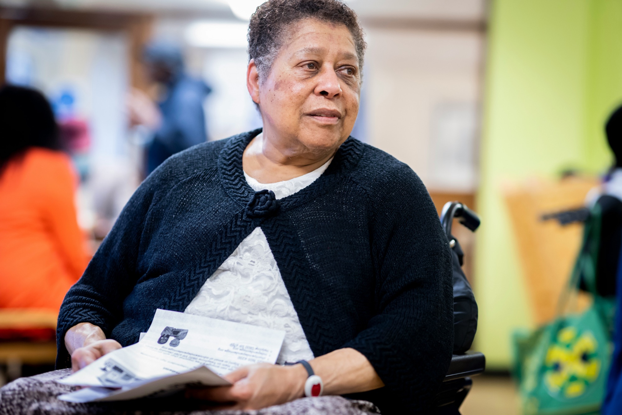 Older woman in a healthcare or community setting